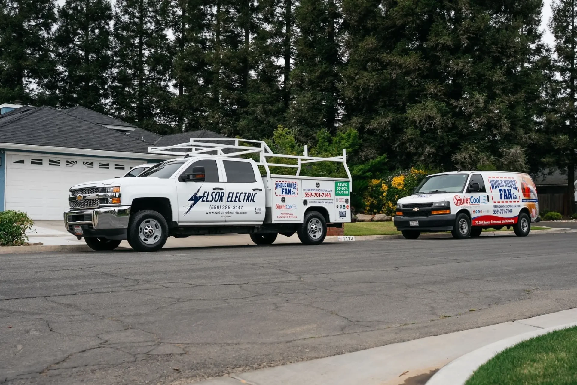 QuietCool Whole House Fan Co. service van parked on a residential street
