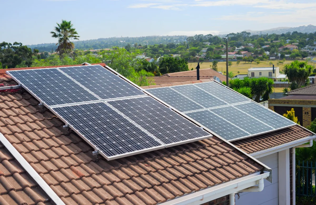 Rooftop solar panels on a California home that still faces high PG&E summer cooling bills