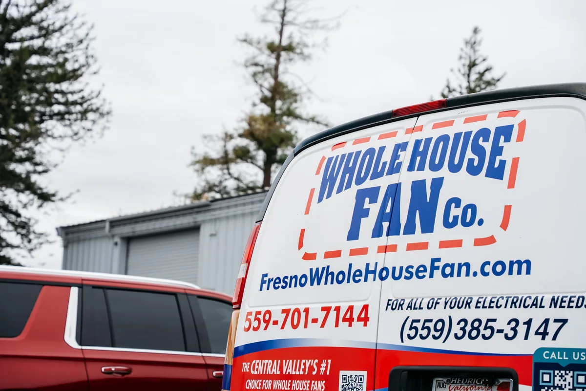 Whole House Fan Co. branded service van used for QuietCool whole house fan installations in Fresno